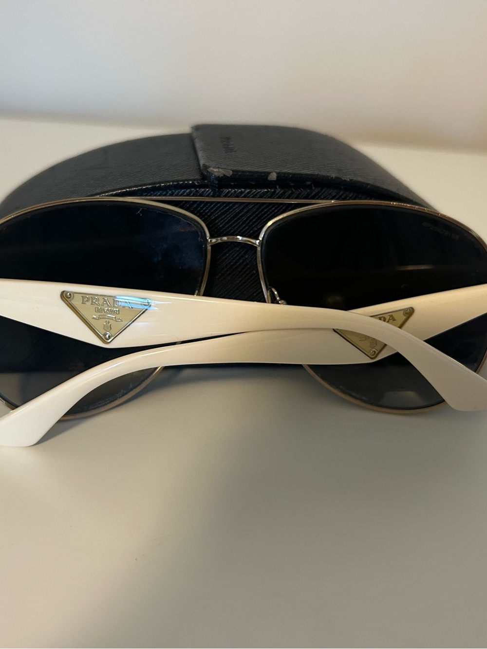 Prada Cream Aviator Sunglasses with Gold Triangle Emblems